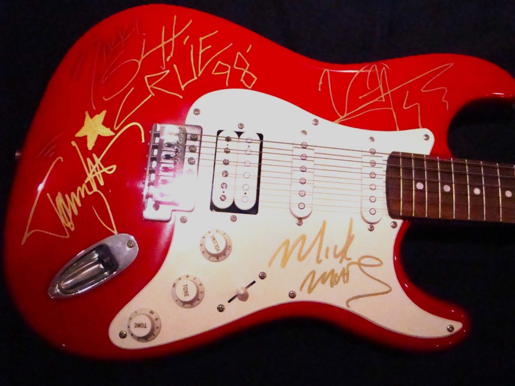 Motley Crue autographed guitar